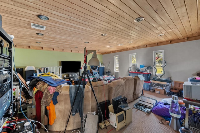 interior space featuring carpet floors and wood ceiling