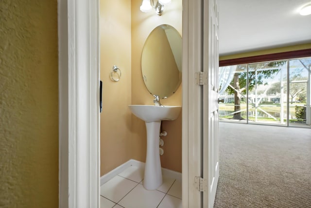 bathroom with tile patterned flooring