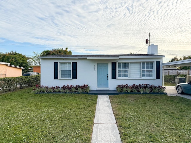 view of front of property with a front lawn