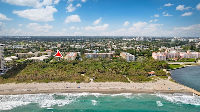 drone / aerial view with a beach view and a water view