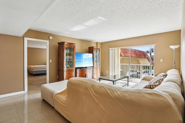 living room with a textured ceiling