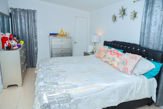 bedroom featuring tile patterned flooring