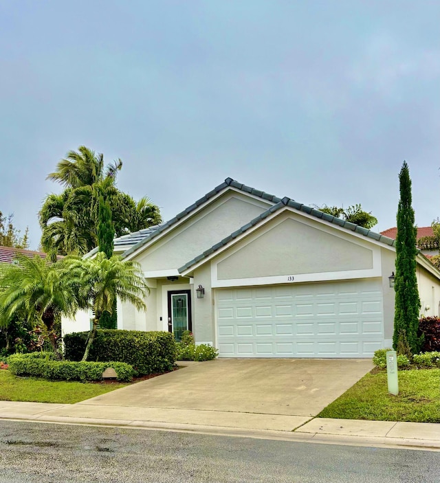 view of front of house with a garage