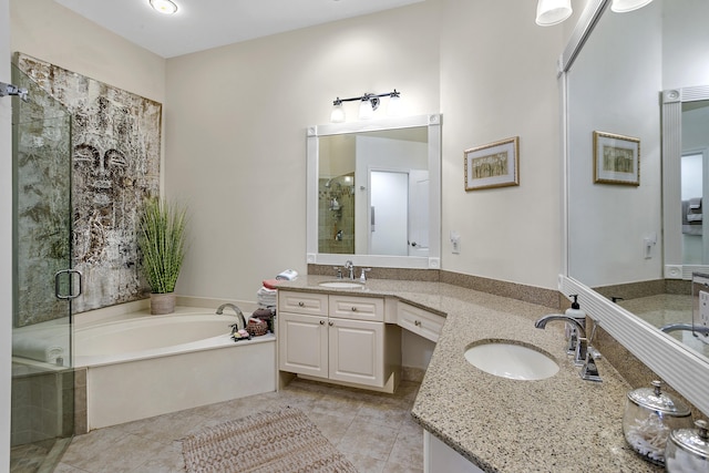 bathroom with vanity, tile patterned floors, and plus walk in shower