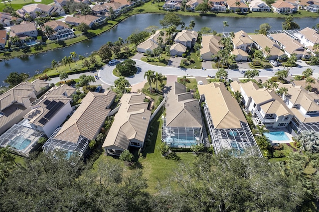 bird's eye view with a water view