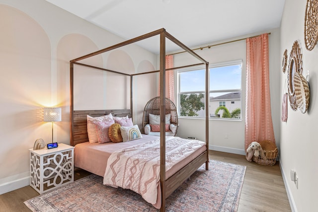 bedroom featuring hardwood / wood-style flooring