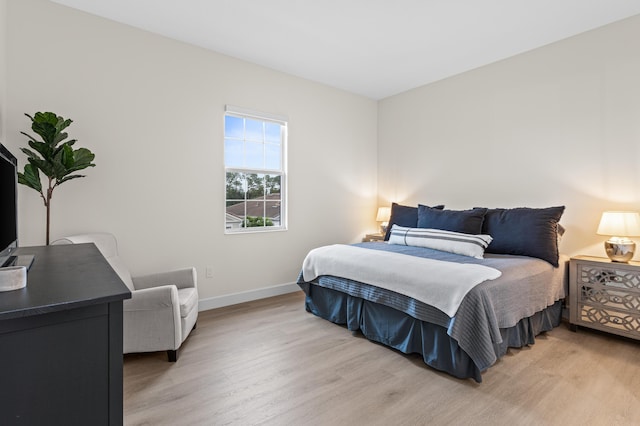 bedroom featuring light wood-type flooring