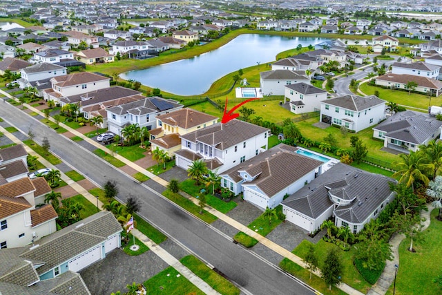 drone / aerial view featuring a water view