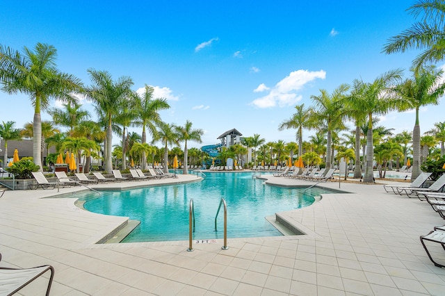 view of swimming pool with a patio area