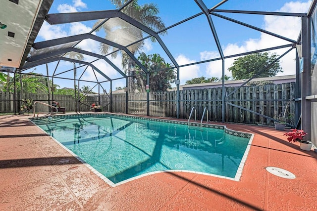 view of pool featuring a lanai and a patio area