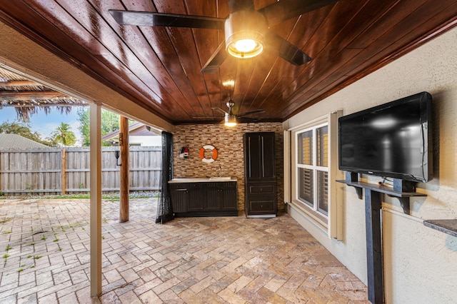 view of patio with ceiling fan