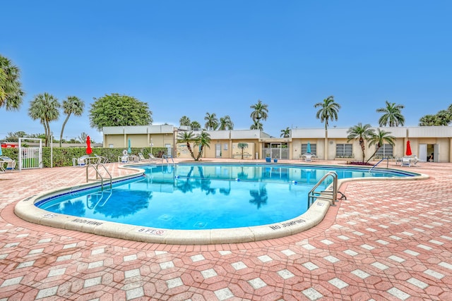 view of swimming pool featuring a patio