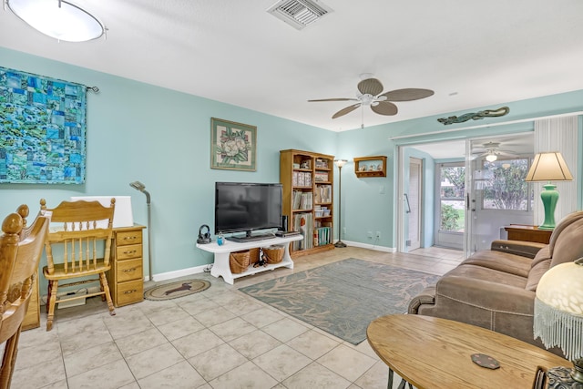 living room with light tile patterned flooring and ceiling fan