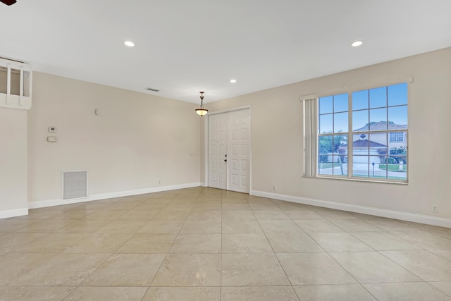 view of tiled spare room