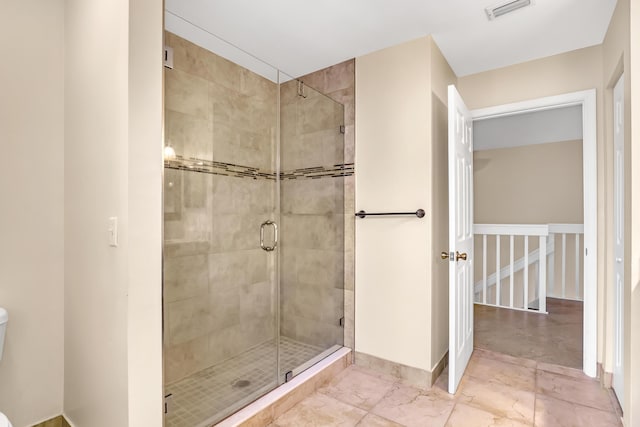 bathroom featuring walk in shower