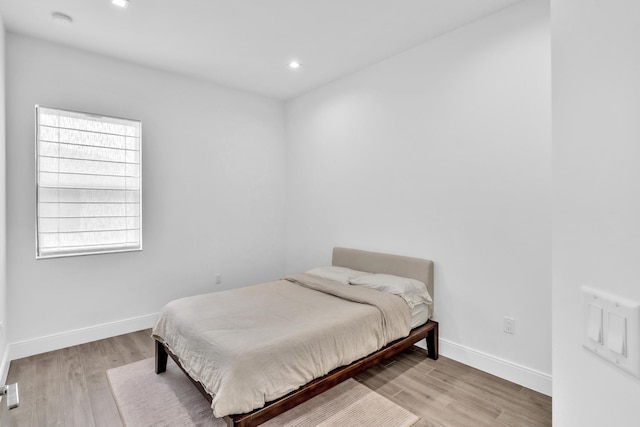 bedroom featuring light hardwood / wood-style flooring