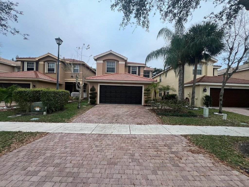 view of front of home with a garage