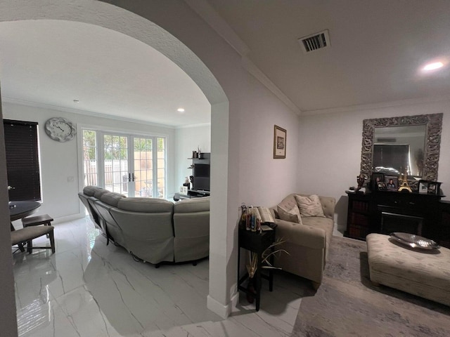 living room with french doors and ornamental molding