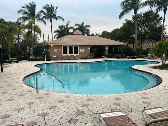 view of pool featuring a patio