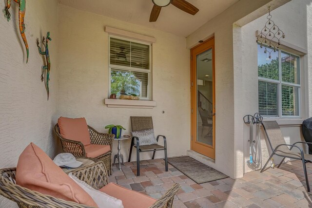 view of patio / terrace featuring a ceiling fan