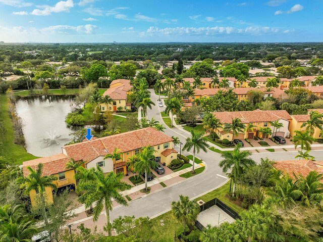 aerial view featuring a residential view and a water view