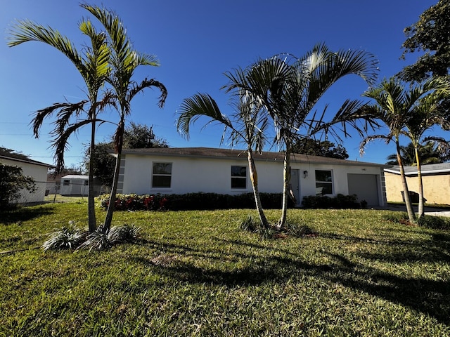 view of front of home with a front yard