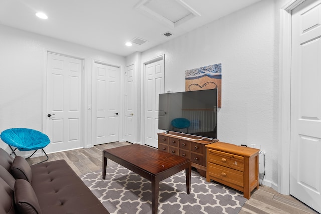 living room with hardwood / wood-style floors