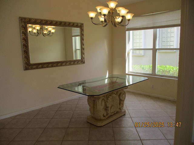 unfurnished dining area featuring tile patterned floors and a chandelier