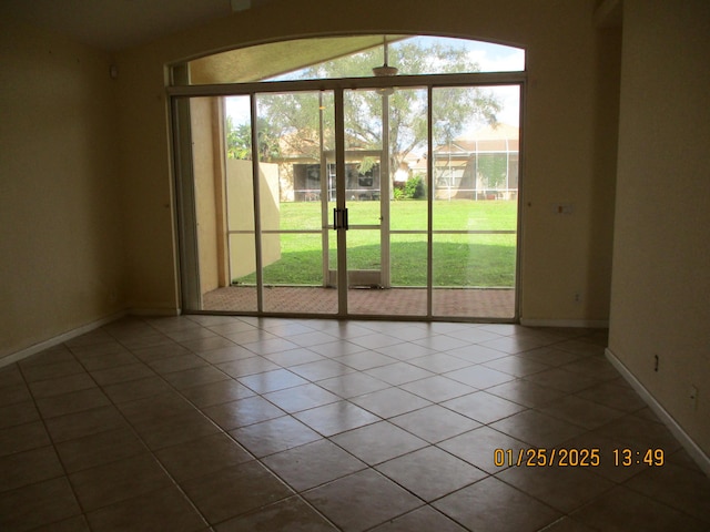 empty room featuring tile patterned flooring