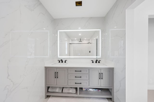 bathroom featuring tile walls, vanity, and a shower