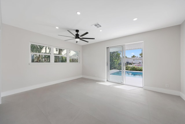 spare room with ceiling fan