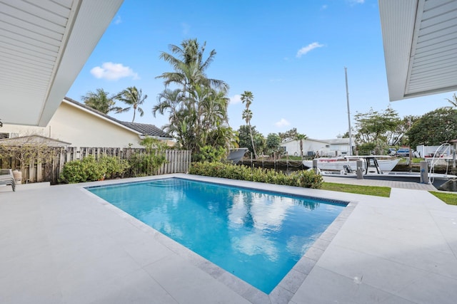 view of swimming pool featuring a patio