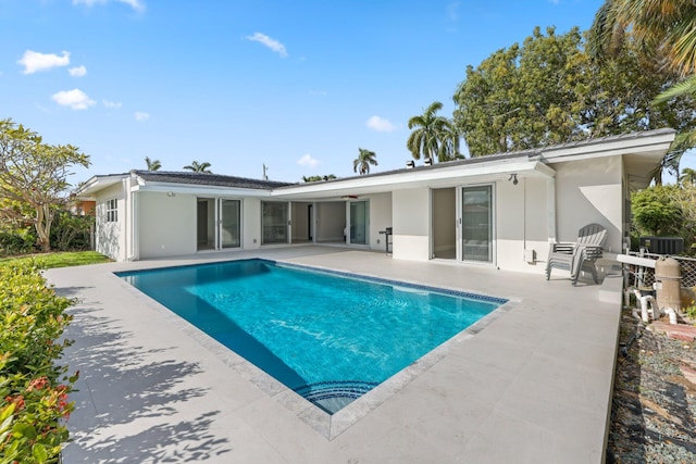 back of house featuring a patio