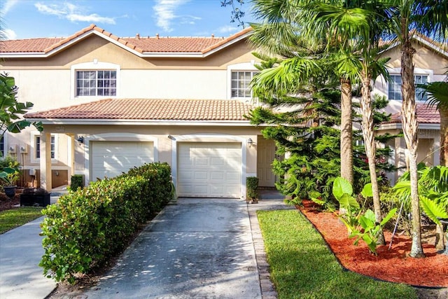 mediterranean / spanish-style house featuring a garage