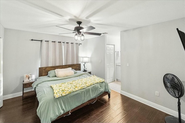 bedroom featuring hardwood / wood-style flooring and ceiling fan