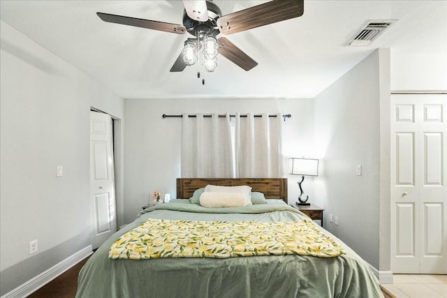 bedroom featuring a closet and ceiling fan