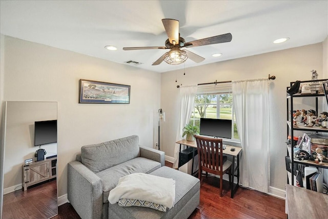 living room with dark hardwood / wood-style floors and ceiling fan