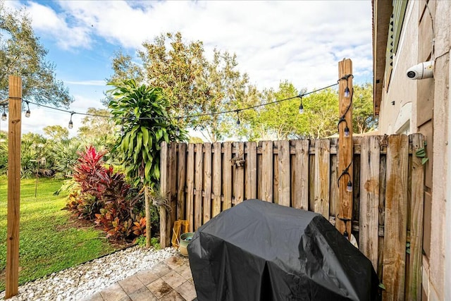 view of patio with a grill