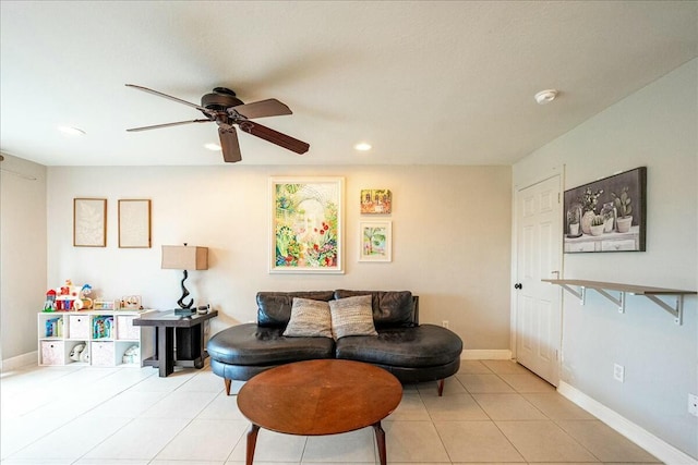 tiled living room with ceiling fan