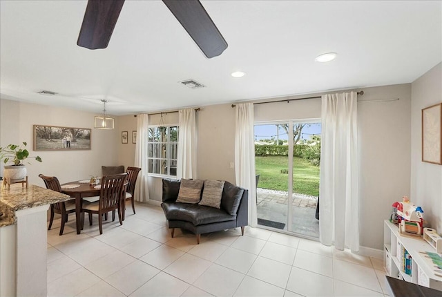 living room with light tile patterned floors