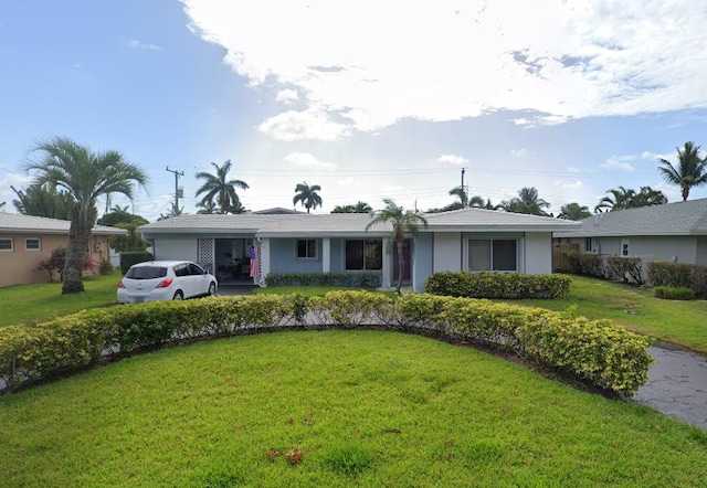 single story home featuring a front yard