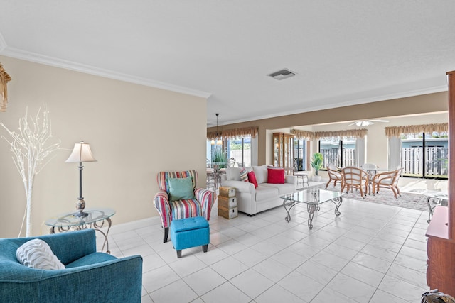 living room featuring crown molding, light tile patterned floors, and ceiling fan