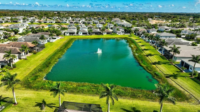 bird's eye view with a residential view and a water view