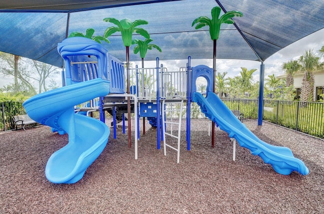 community jungle gym with fence