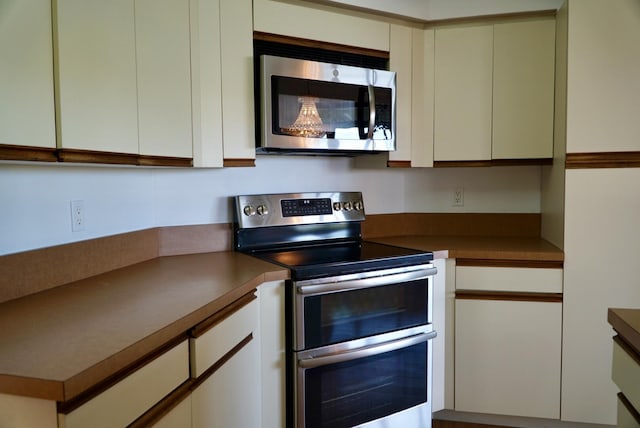 kitchen with white cabinets and stainless steel appliances