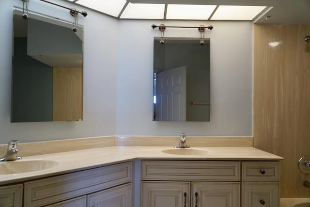 bathroom with  shower combination and vanity