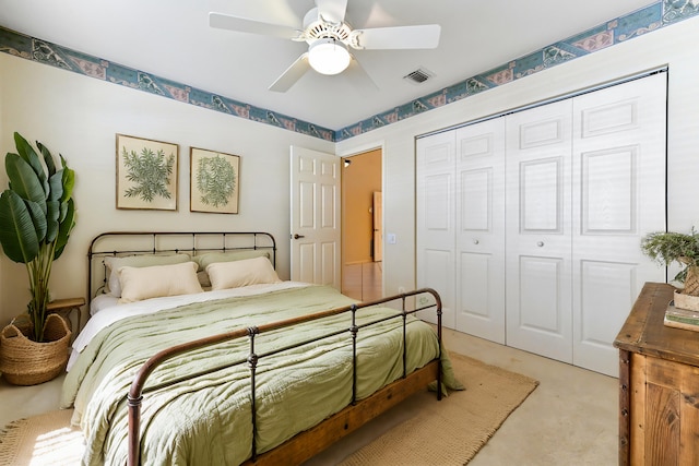 carpeted bedroom featuring ceiling fan and a closet