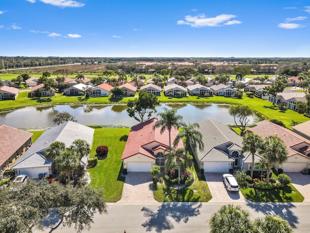 drone / aerial view featuring a water view