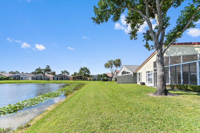 view of yard with a water view