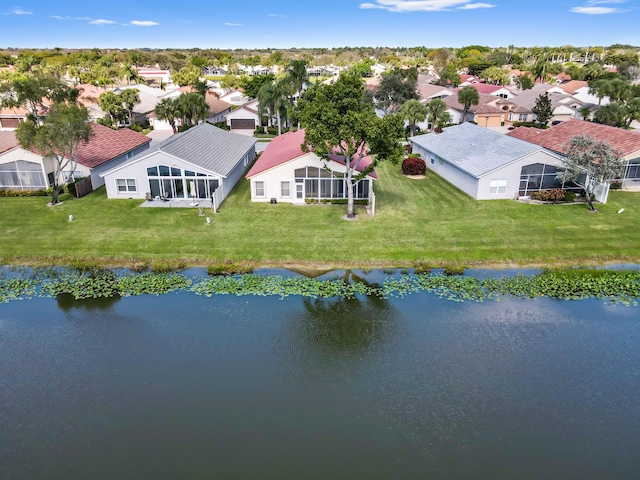 drone / aerial view with a water view